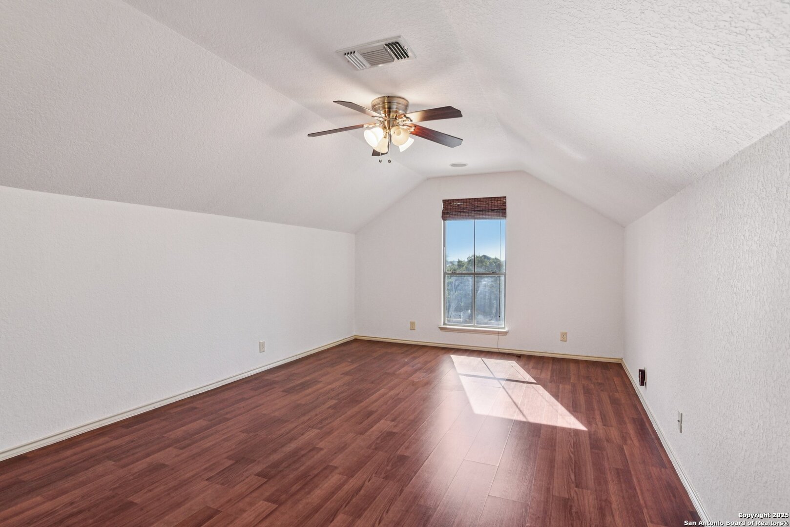 3524 Angora Trail Schertz, TX 78154 - Photo 19 of 25 a view of empty room with wooden floor and fan
