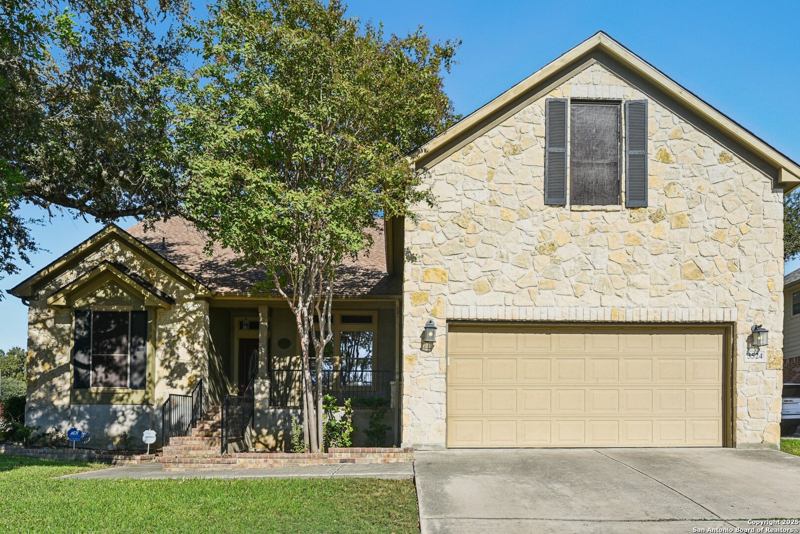 3524 Angora Trail Schertz, TX 78154 - Photo 2 of 25 front view of a house with a yard and an trees