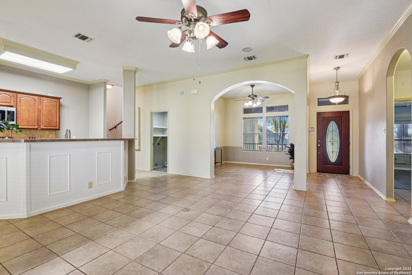 3524 Angora Trail Schertz, TX 78154 - Photo 7 of 25 a view of a kitchen with a sink and a refrigerator