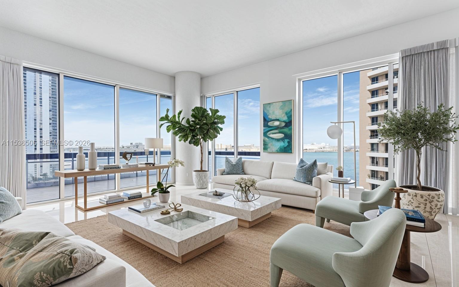 900 Brickell Key Boulevard, Unit 1002 Miami, FL 33131 - Photo 1 of 87 a living room with furniture potted plant and a large window