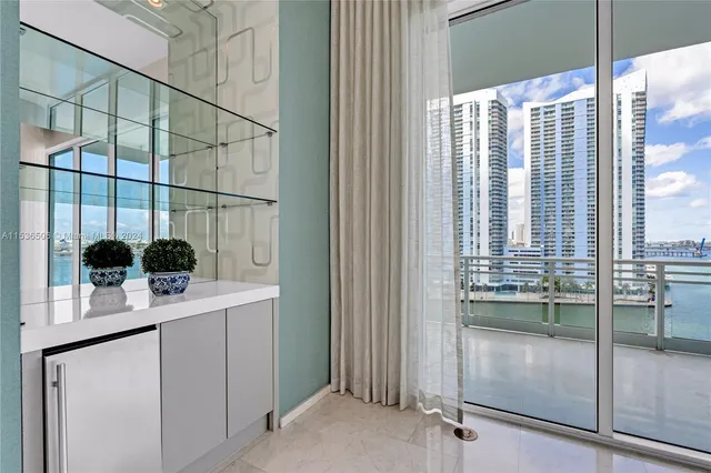 a spacious bathroom with a tub sink and mirror