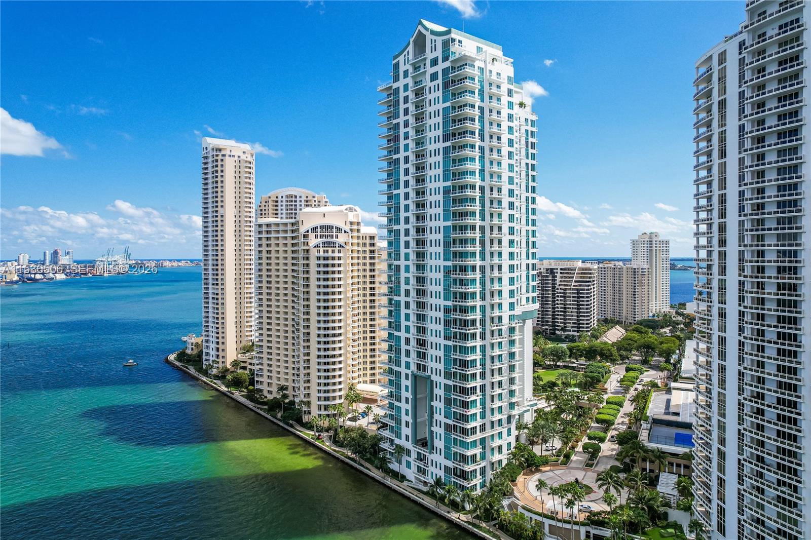 900 Brickell Key Boulevard, Unit 1002 Miami, FL 33131 - Photo 81 of 87 a view of a city with tall buildings
