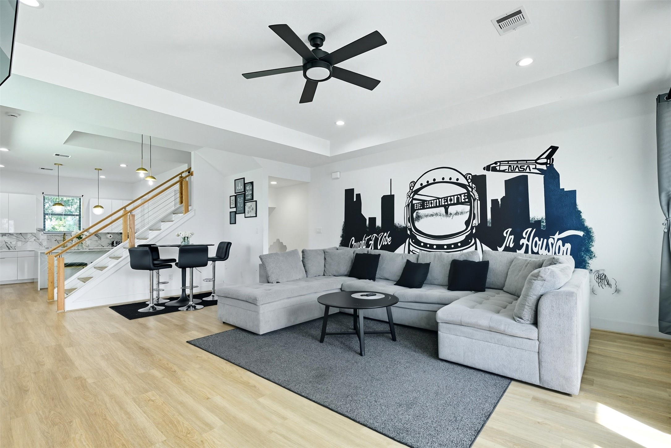 3605 Bremond Street Houston, TX 77004 - Photo 2 of 35 a living room with furniture and a wooden floor