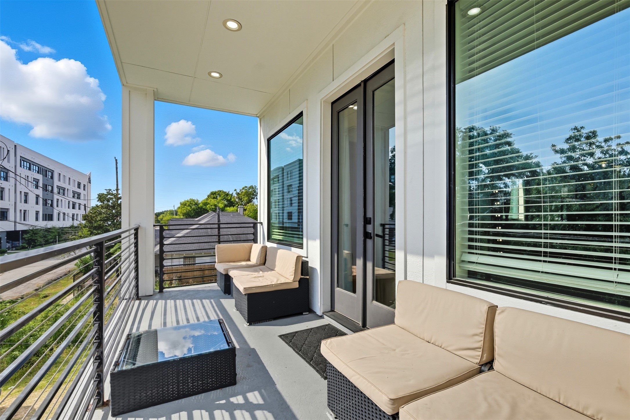 3605 Bremond Street Houston, TX 77004 - Photo 9 of 35 a balcony with furniture and a potted plant