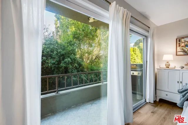 a view of a room that has a window