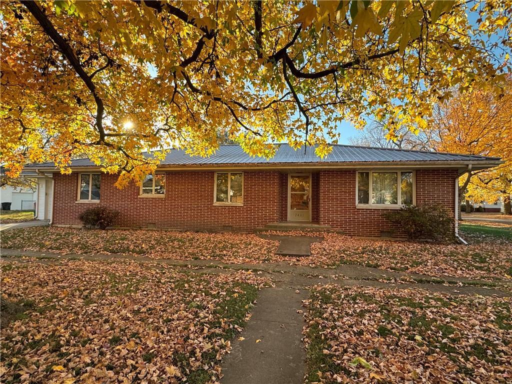 2401 Prairie Avenue Mattoon, IL 61938 - Photo 1 of 1 a front view of a house with a garden