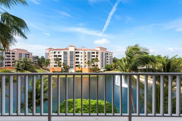 a view of a balcony with lake view
