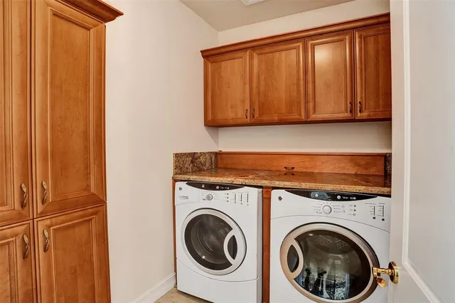 a bathroom with a granite countertop tub sink and shower