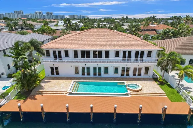 a kitchen with granite countertop a sink and cabinets