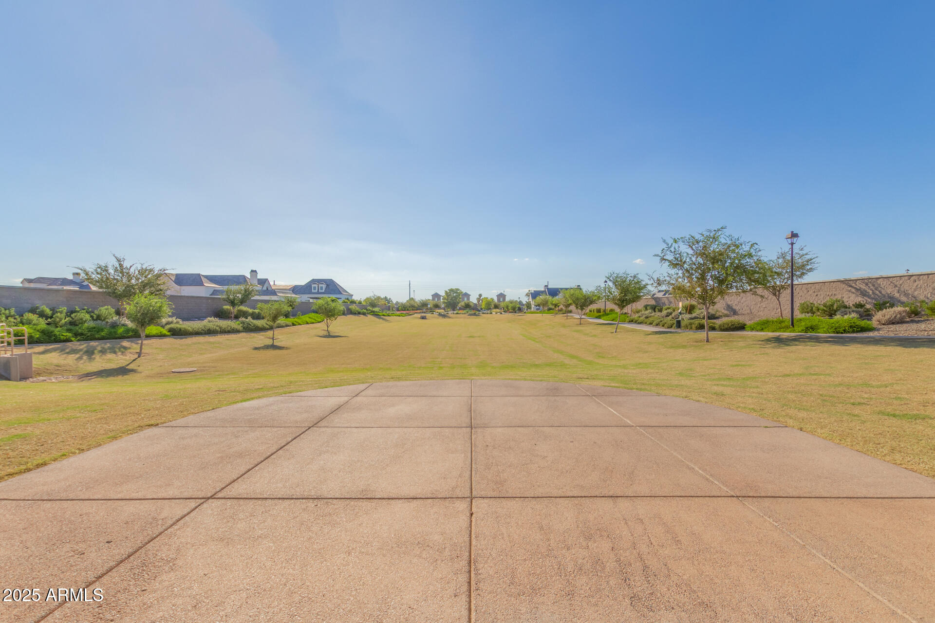 2694 East Blue Sage Road, Unit 127 Gilbert, AZ 85297 - Photo 3 of 12 a view of an ocean and beach