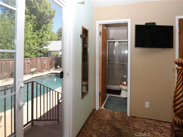 a view of a balcony from back yard