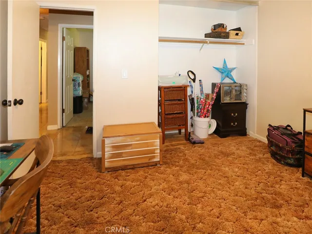 a room with furniture and a window