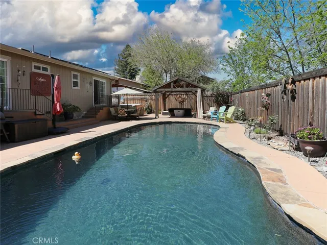a view of a house with a swimming pool