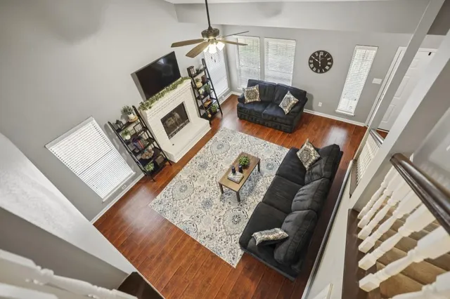 a view of living room with furniture and a flat screen tv