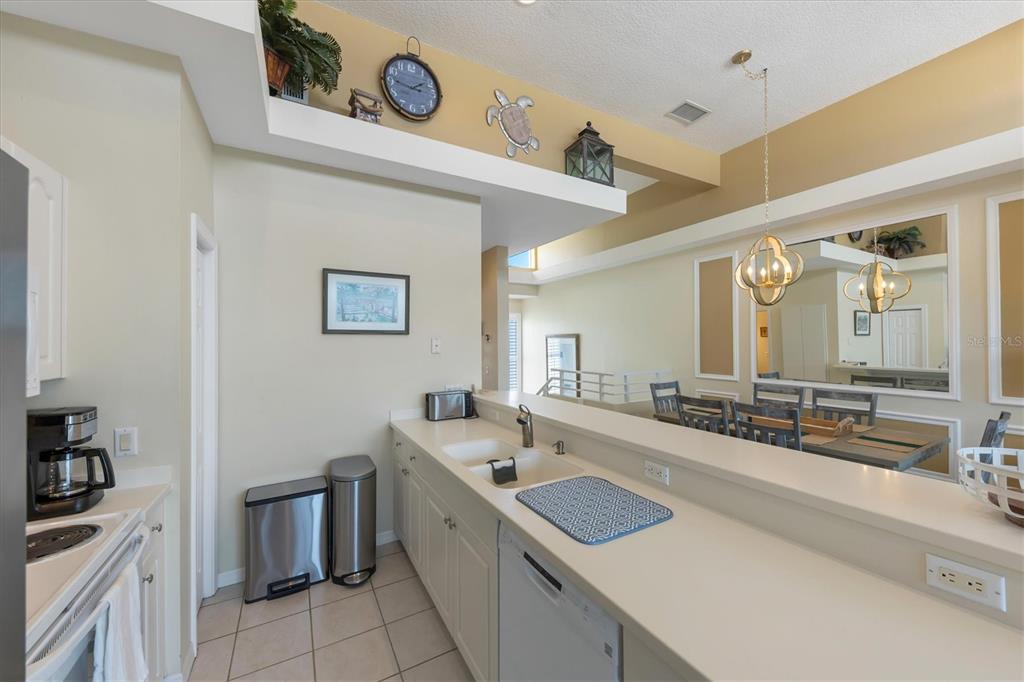 8272 Harborside Circle Englewood, FL 34224 - Photo 13 of 45 a bathroom with a sink and a mirror