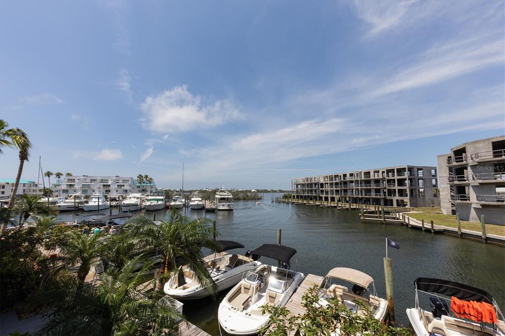 8272 Harborside Circle Englewood, FL 34224 - Photo 13 of 50 a terrace with outdoor seating and city view