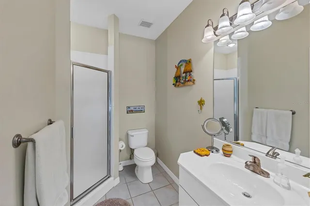 a view of bathroom with a sink and a toilet