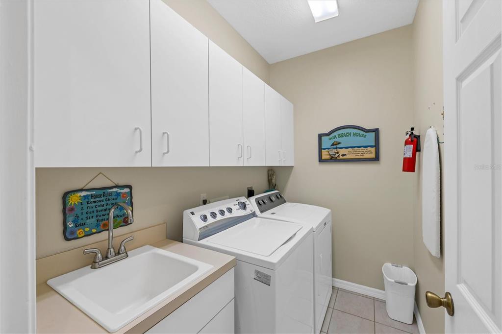 8272 Harborside Circle Englewood, FL 34224 - Photo 16 of 50 a view of bathroom with a sink and a toilet