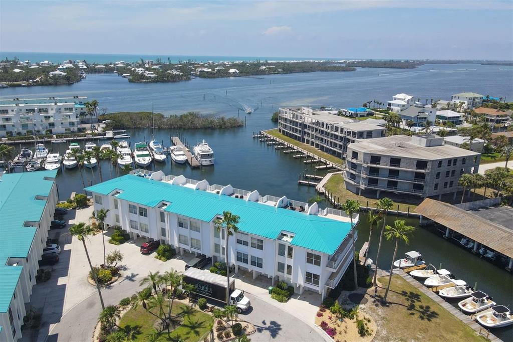 8272 Harborside Circle Englewood, FL 34224 - Photo 2 of 50 a view of a city and lake