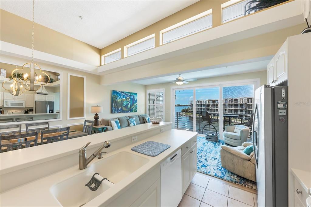 8272 Harborside Circle Englewood, FL 34224 - Photo 24 of 50 a room with a large window and couch