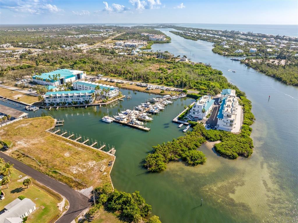 8272 Harborside Circle Englewood, FL 34224 - Photo 34 of 45 an aerial view of residential houses with outdoor space