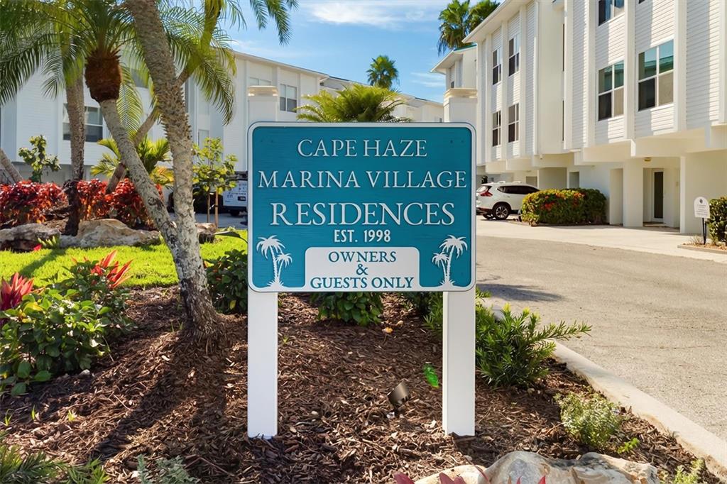 8272 Harborside Circle Englewood, FL 34224 - Photo 40 of 45 a sign on the side of the road