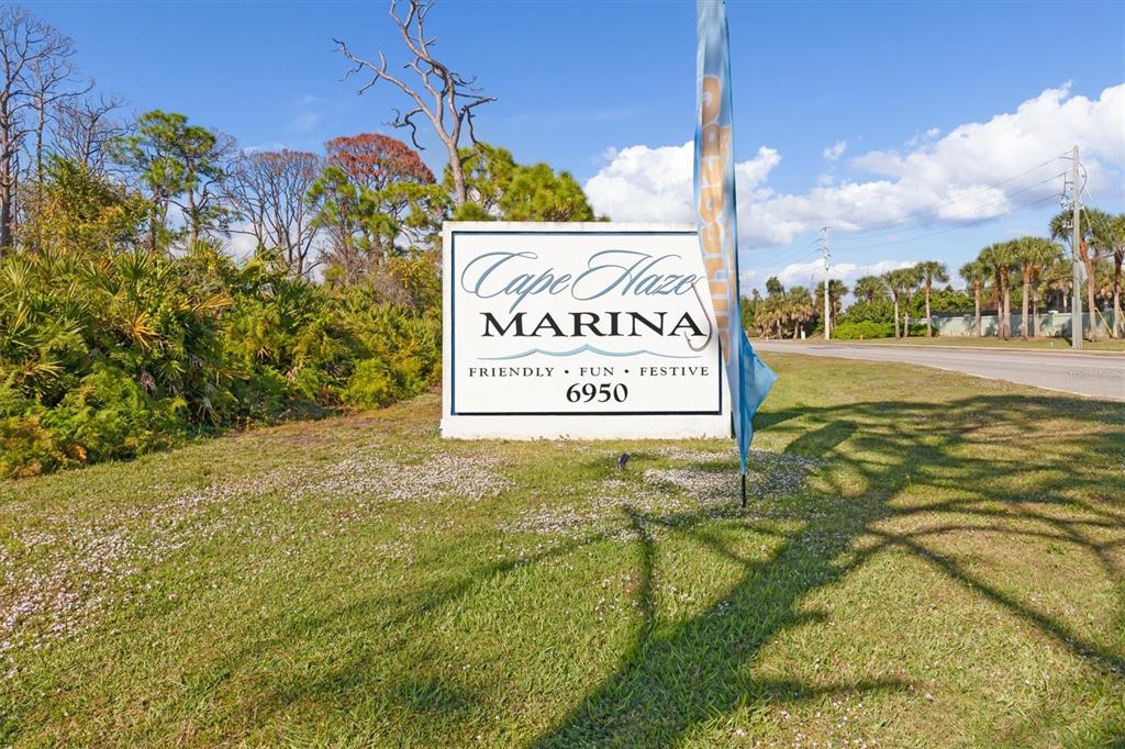 8272 Harborside Circle Englewood, FL 34224 - Photo 43 of 45 a sign that is on the side of the road