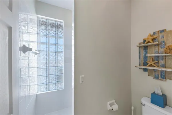 a room with cabinets and a window
