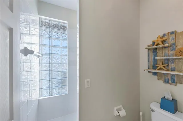 a room with cabinets and a window