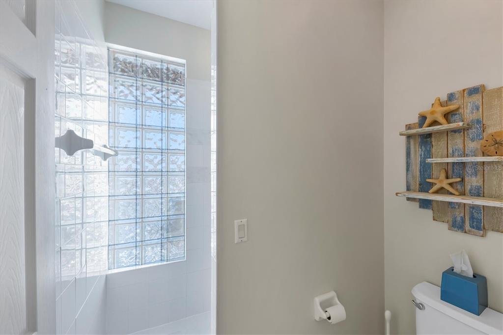 8272 Harborside Circle Englewood, FL 34224 - Photo 6 of 45 a room with cabinets and a window