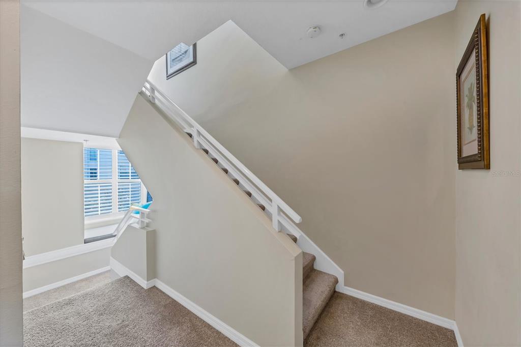 8272 Harborside Circle Englewood, FL 34224 - Photo 7 of 50 a view of entryway with stairs