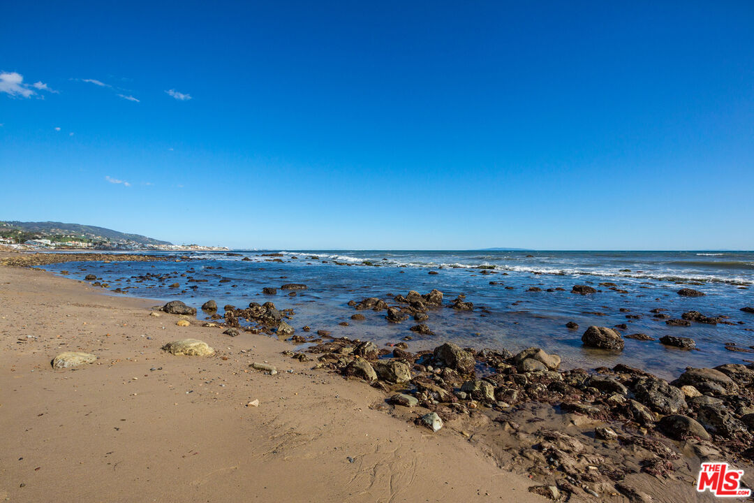 24102 Malibu Road Malibu, CA 90265 - Photo 13 of 14 an aerial view of beach and city