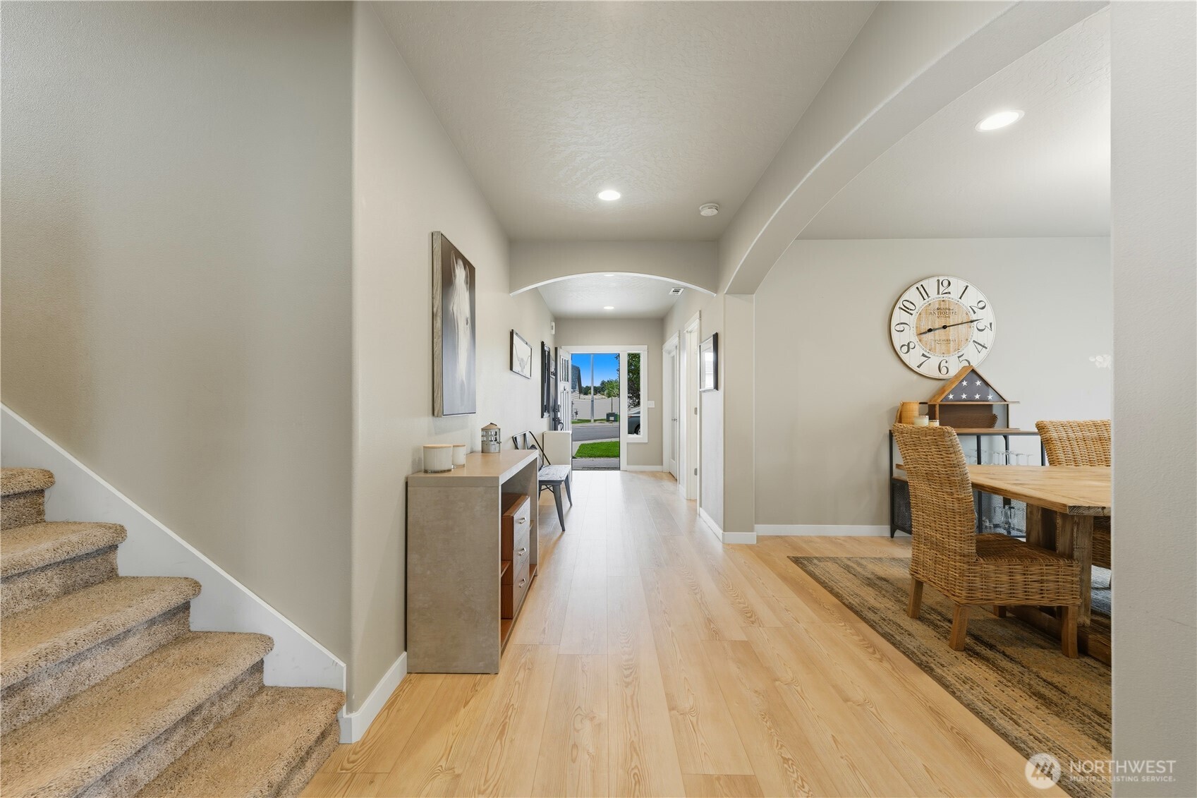 1382 Caprio Loop Walla Walla, WA 99362 - Photo 11 of 36 a view of a living room and kitchen with a sink