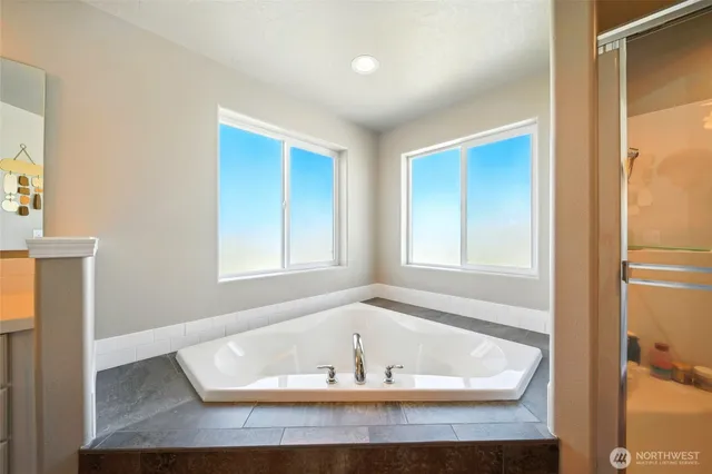 a view of bath tub sitting in a bathroom
