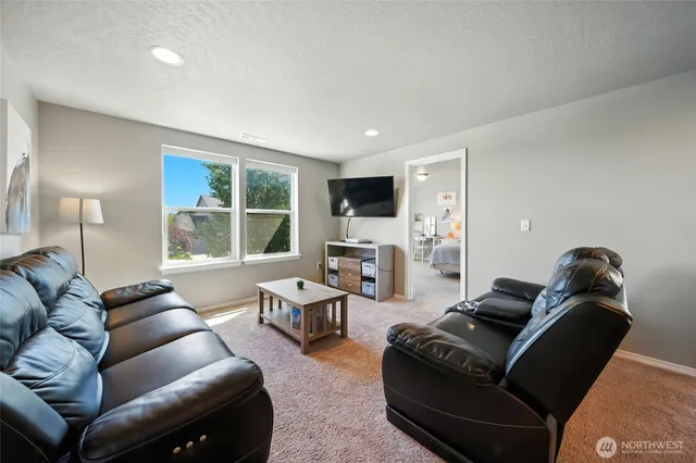 a living room with furniture window and a lamp