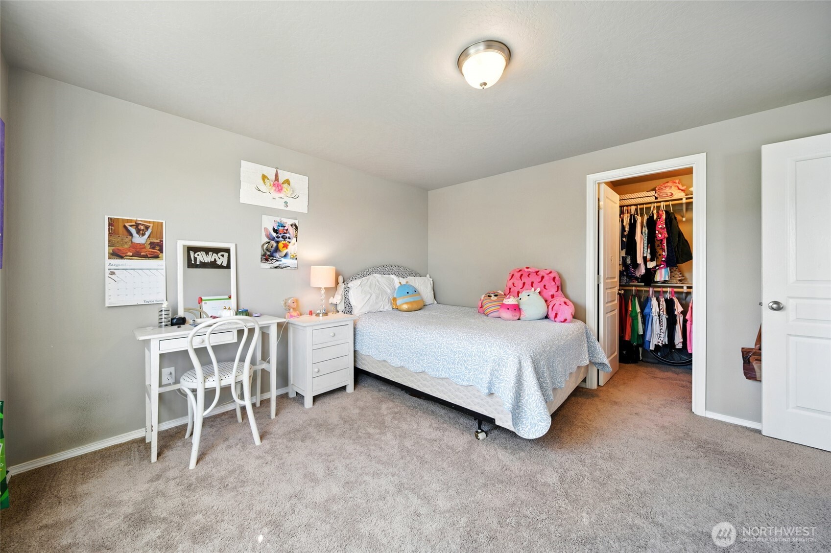 1382 Caprio Loop Walla Walla, WA 99362 - Photo 19 of 36 a bedroom with a bed and a table