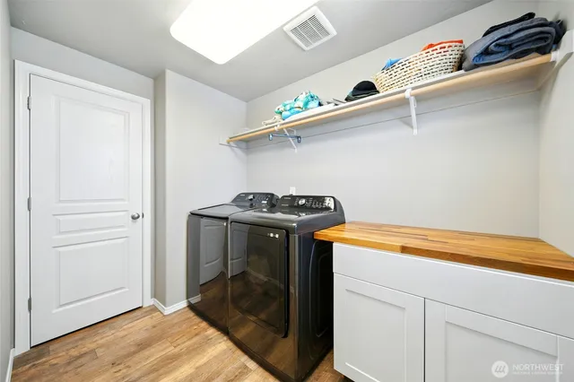 an aerial view of a house with outdoor space