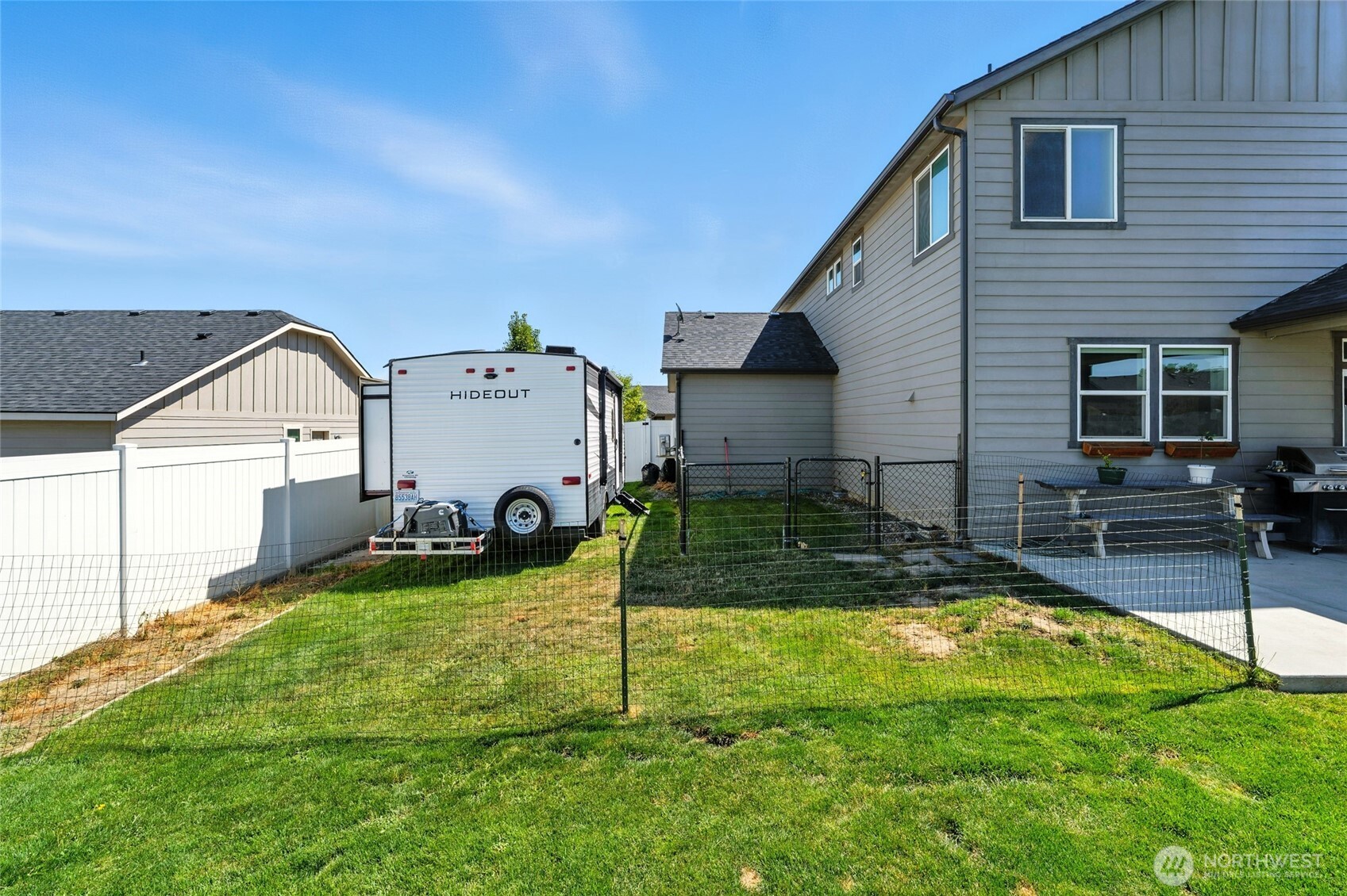 1382 Caprio Loop Walla Walla, WA 99362 - Photo 29 of 36 a view of a house with backyard and sitting area