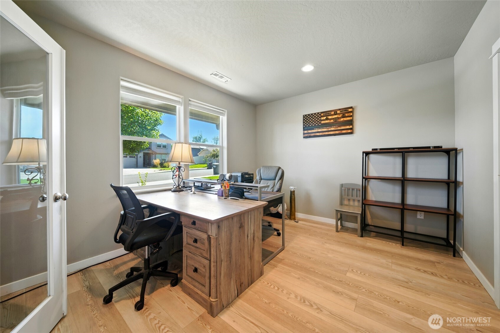 1382 Caprio Loop Walla Walla, WA 99362 - Photo 9 of 36 a view of a workspace with furniture and a window