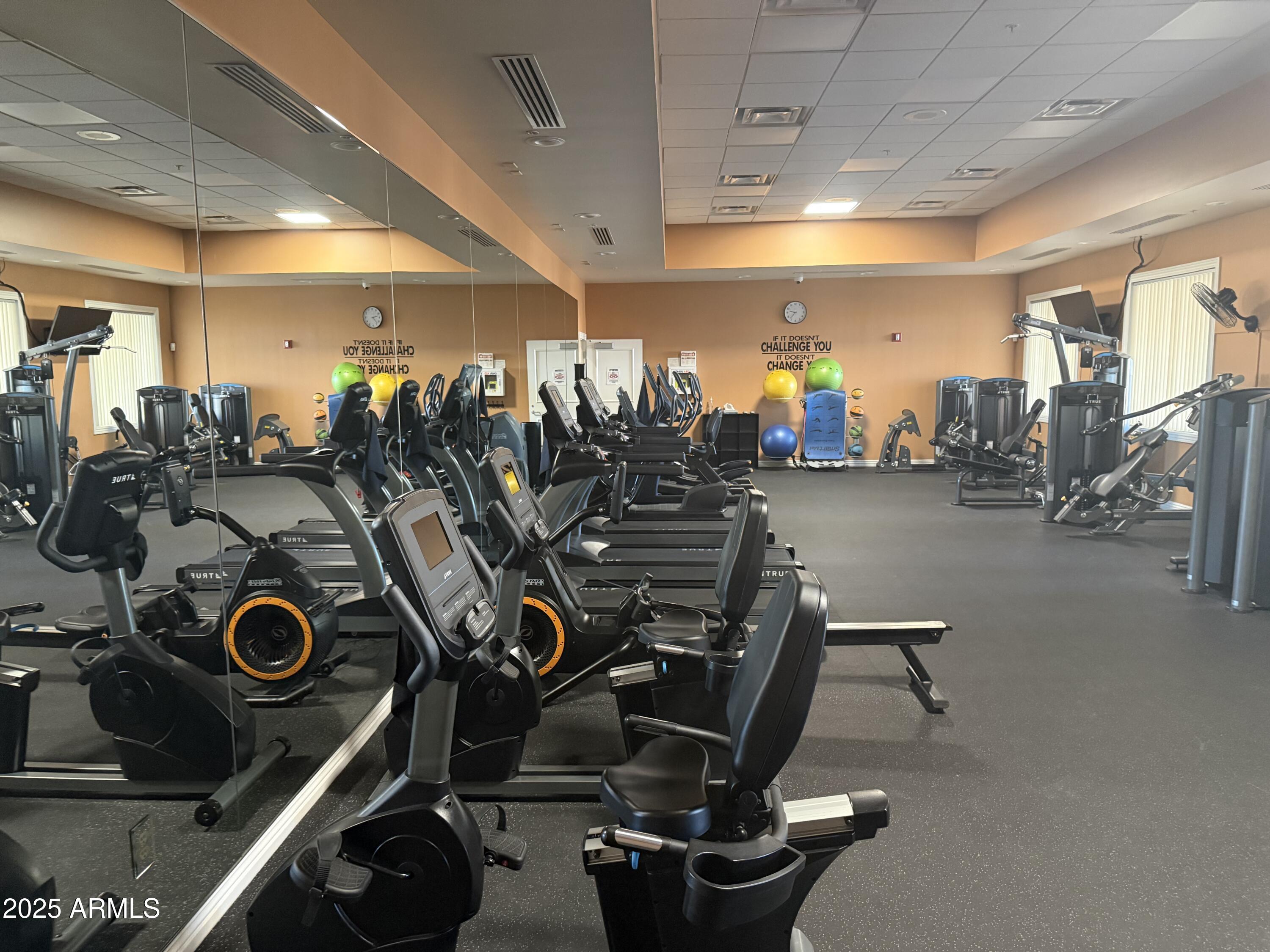 3301 South Goldfield Road, Unit 2090 Apache Junction, AZ 85119 - Photo 31 of 35 a view of a room with gym equipment