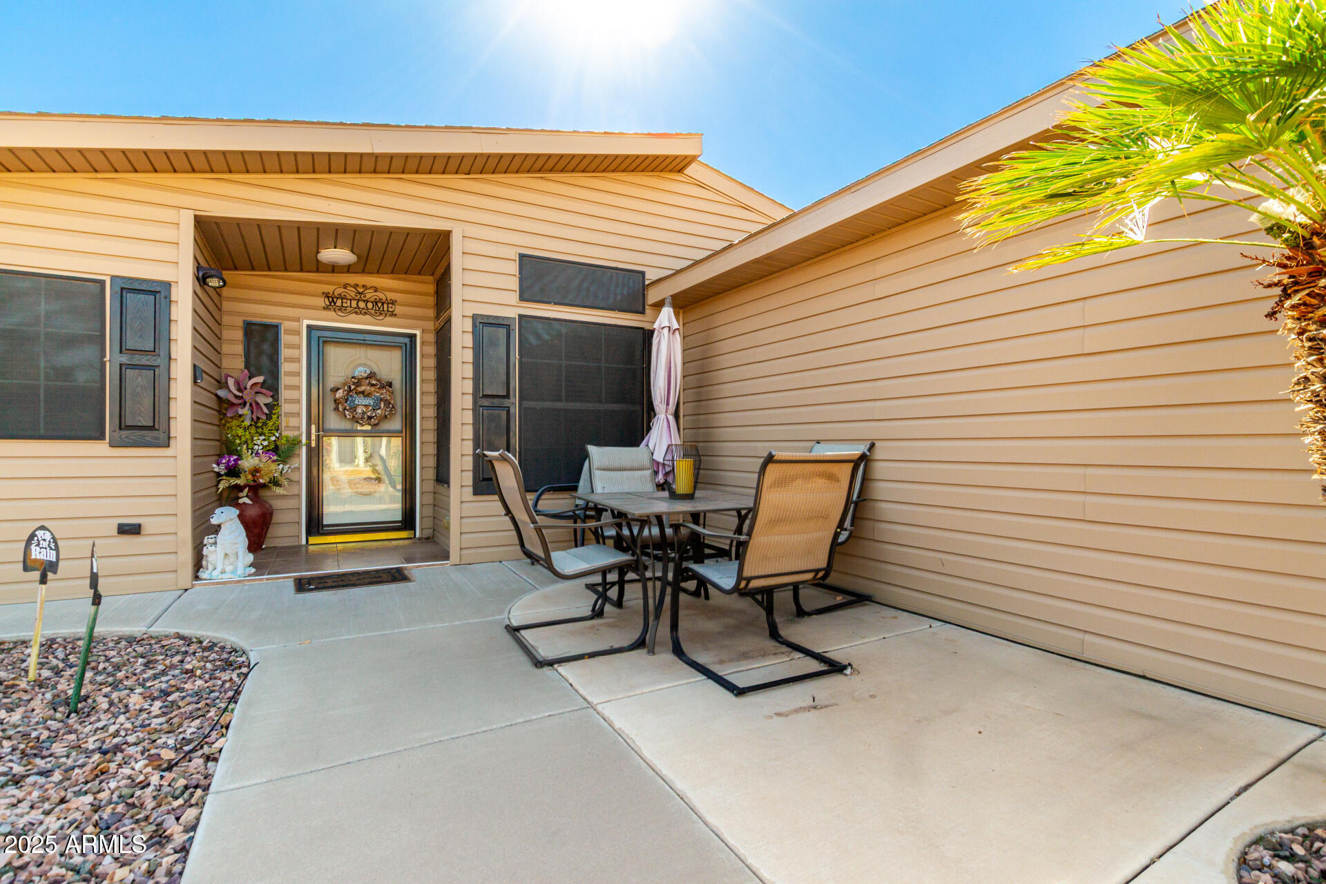 3301 South Goldfield Road, Unit 2090 Apache Junction, AZ 85119 - Photo 33 of 35 a view of a two chairs in the patio