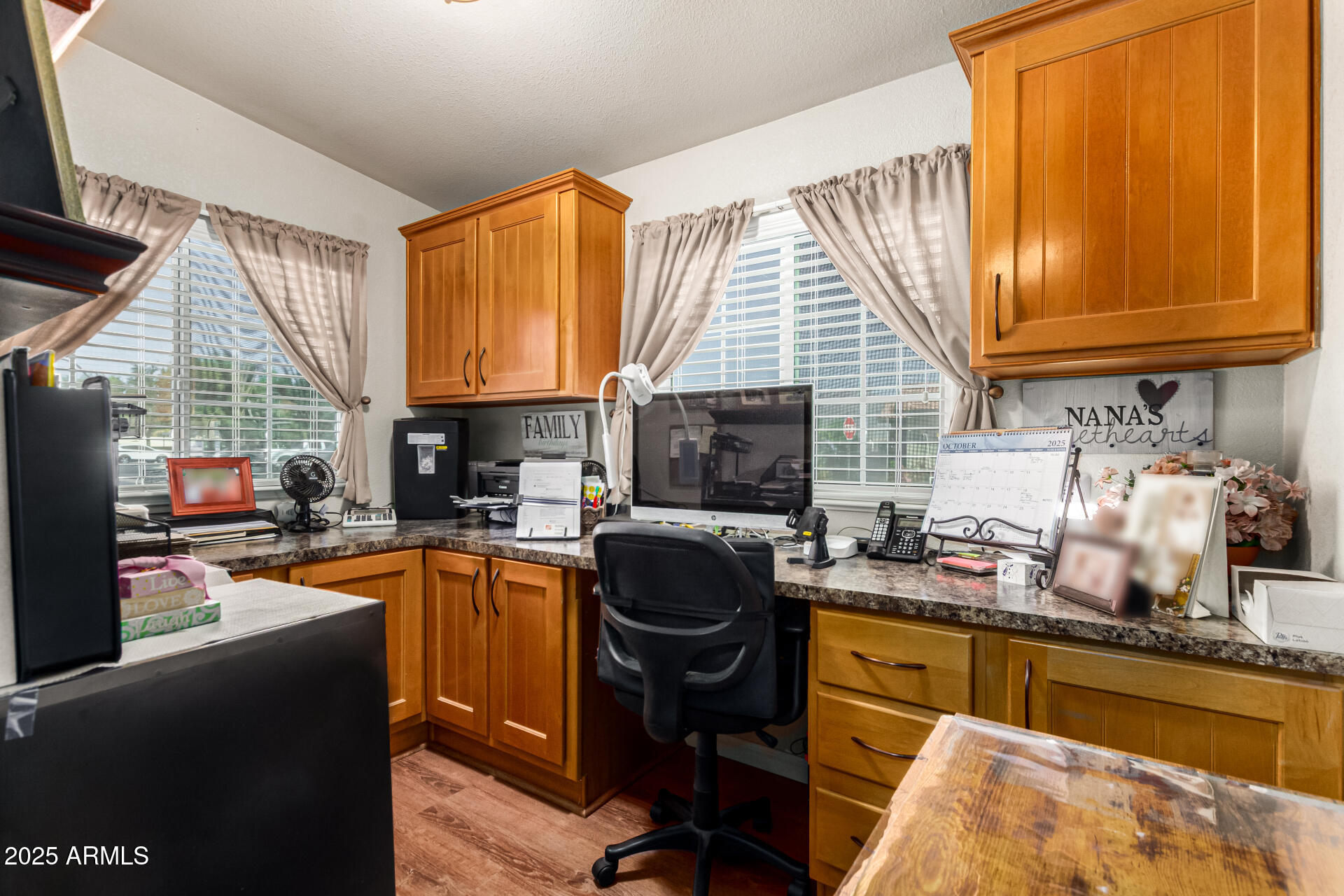 3301 South Goldfield Road, Unit 2090 Apache Junction, AZ 85119 - Photo 6 of 35 a kitchen with stainless steel appliances granite countertop sink stove top oven and cabinets