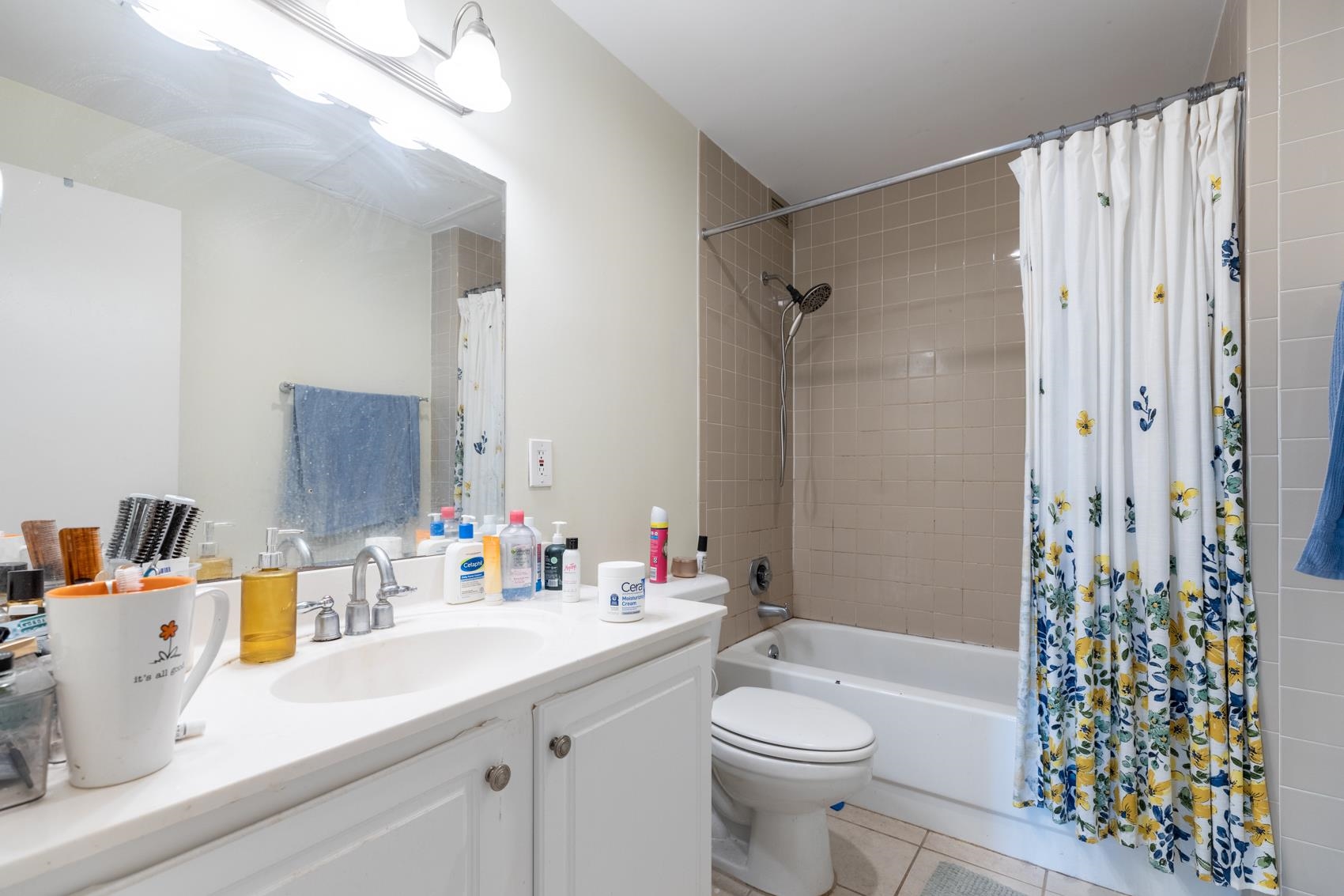 655 Riverside Drive, Unit 1008A Memphis, TN 38103 - Photo 4 of 10 Bathroom featuring tile patterned flooring, vanity, and shower / tub combo
