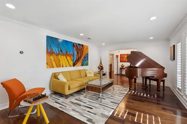 a living room with furniture and a rug
