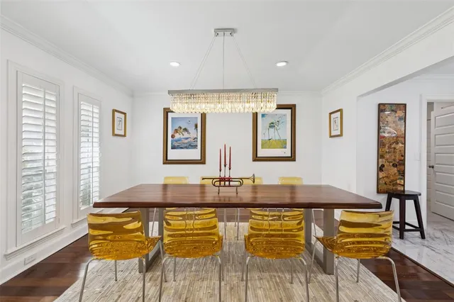 a kitchen with counter top space and wooden floor