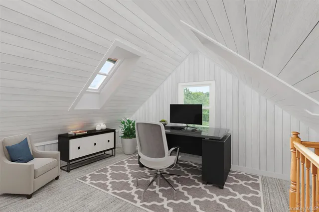 a view of a workspace with furniture