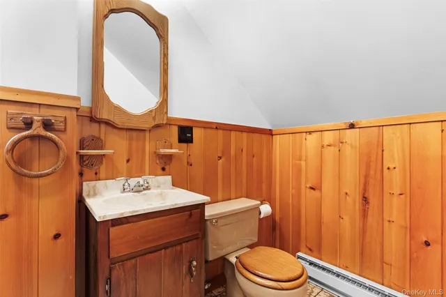 a bathroom with a shower and a window