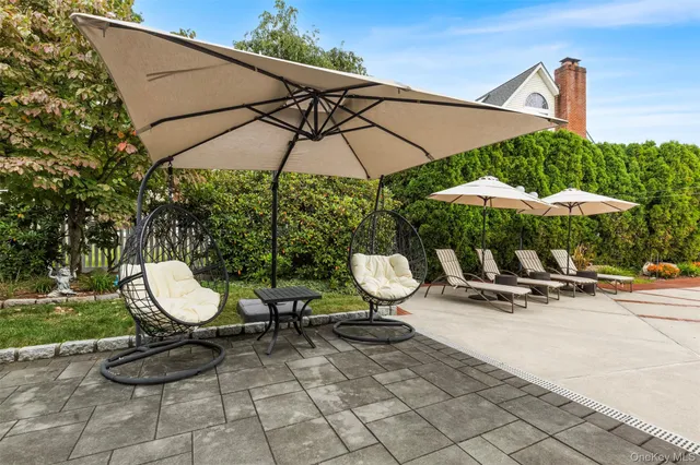 a view of outdoor space with pool table and chairs
