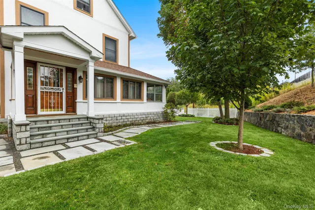 a house view with a garden space