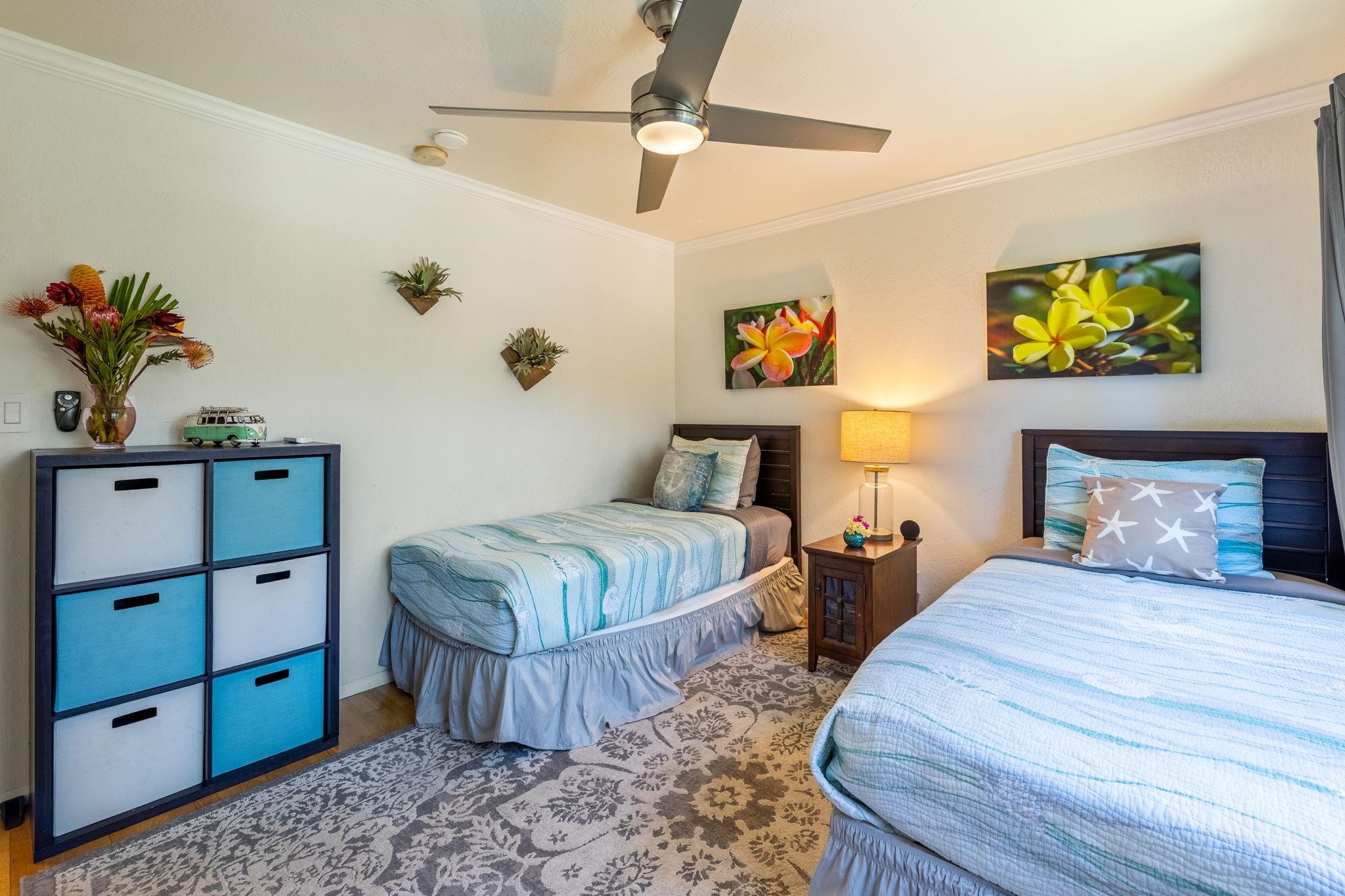 777 South Kihei Road, Unit 221G Kihei, HI 96753 - Photo 18 of 50 a bedroom with 2 bed and painting on the wall